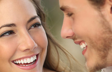 couples-smiling-after-restoraive-dentistry